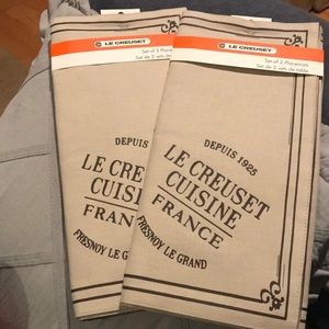 Le Creuset placemats. 4 Brand New. Color espresso.